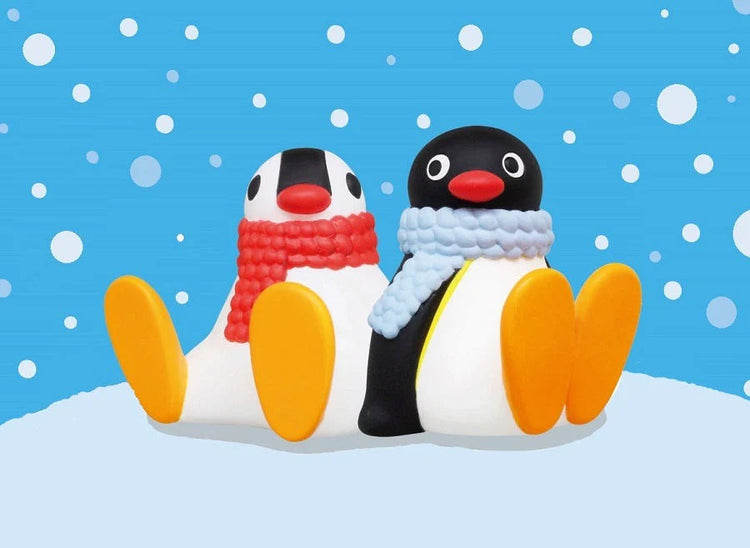 Winter Pingu penguin pair with red and light blue knitted scarves, classic claymation cartoon official artwork with snowflake backdrop