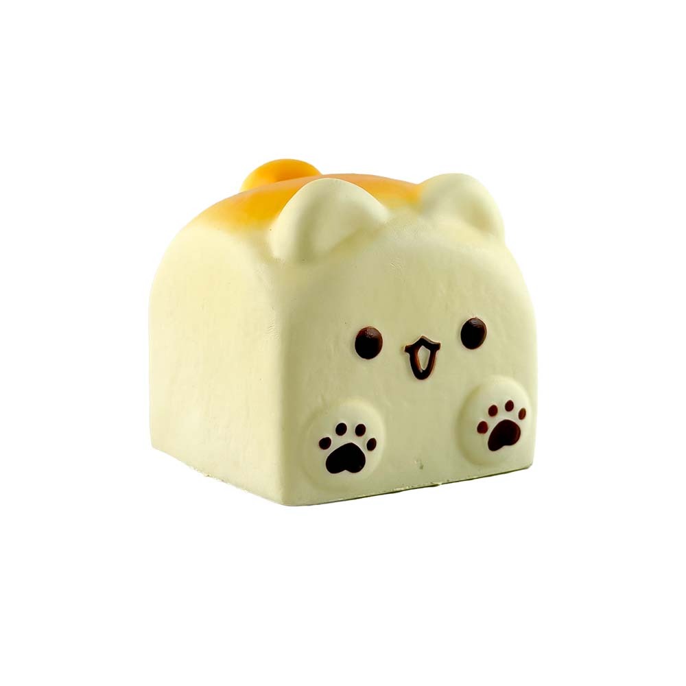 White background e-commerce product shot of Fluffmellies Doggy Toast squishy toy sealed transparent PET box, cute puppy toast loaf slow rebound scented stress relief squeeze toy