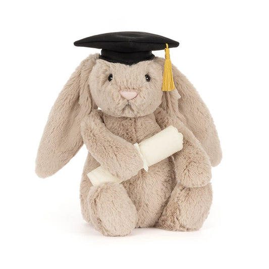 Jellycat Bashful Bunny Graduation plush doll, classic floppy cream bunny dressed in graduation mortarboard and gown, holding tiny fabric diploma, sentimental graduation collectible soft toy