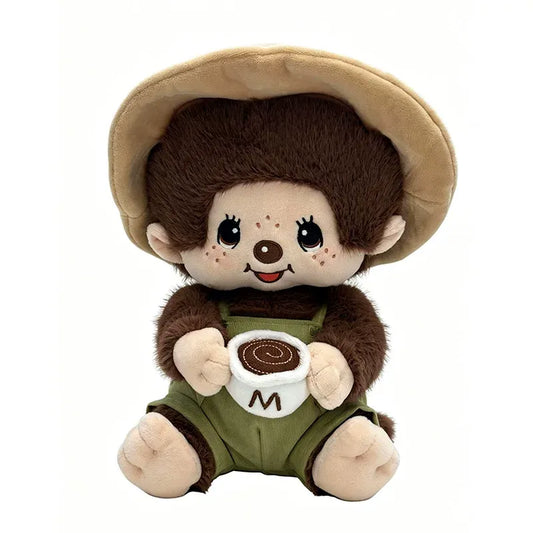 White background studio shot of Monchhichi Mon Mon Farm Coffee Themed Sitting Boy Doll, 30cm café gardener costume fluffy monkey plush collectible toy display