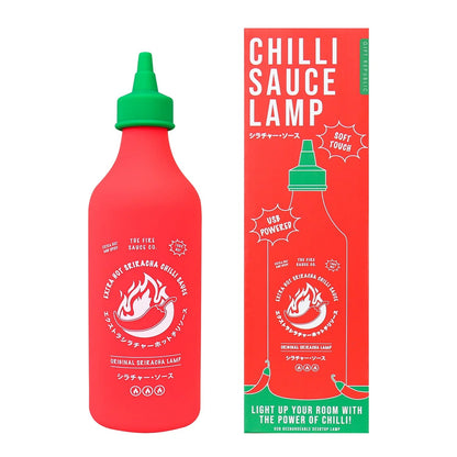 White background studio shot of Sriracha Chilli Sauce silicone LED lamp, iconic rooster hot sauce bottle shaped recharge novelty ambient night light home decor display